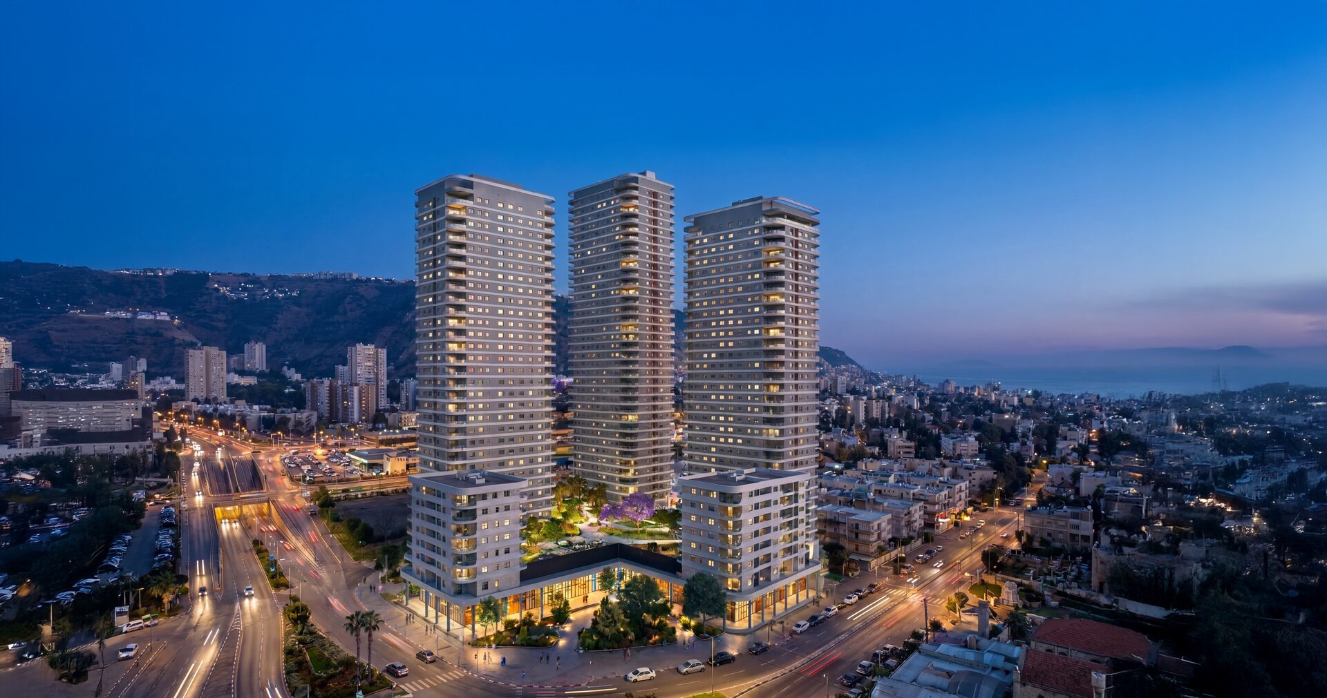 בת גלים — מגדלי היוקרה מול נוף הים והכרמל בשעת בין־ערביים